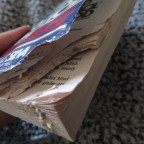 Paranormal Hijinks, Dog-eared page in a brand new book